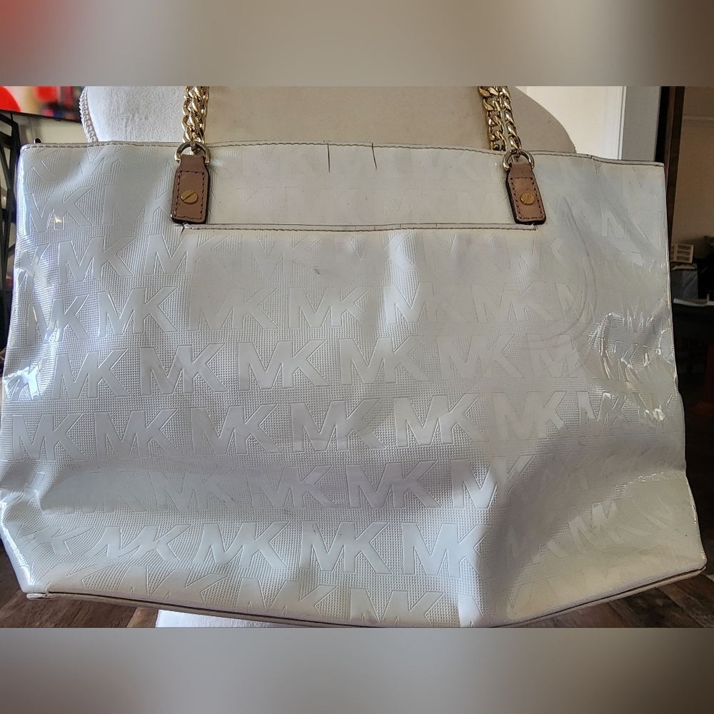 Preowned fair condition Michael Kors white monogrammed tote bag